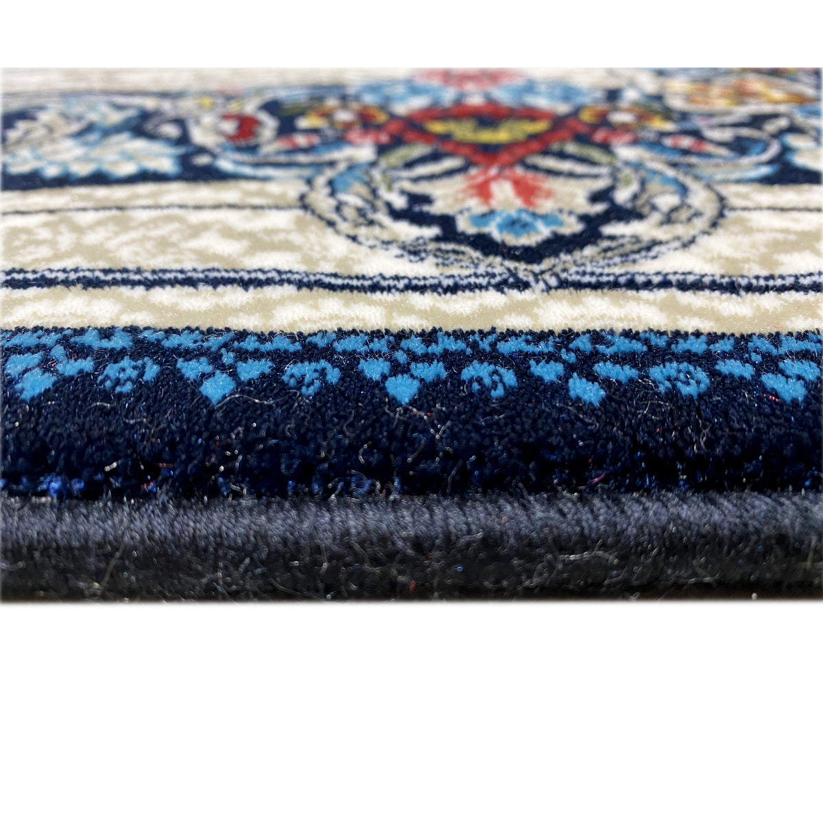 Blau-weißer Teppich mit Medaillon und floralem Bordürendesign