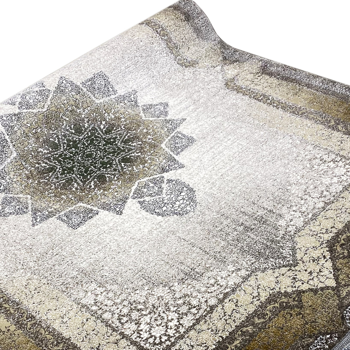 Teppich mit geometrischen Ornamenteinsätzen in hellbeige-grau, grau/schwarz gesäumt
