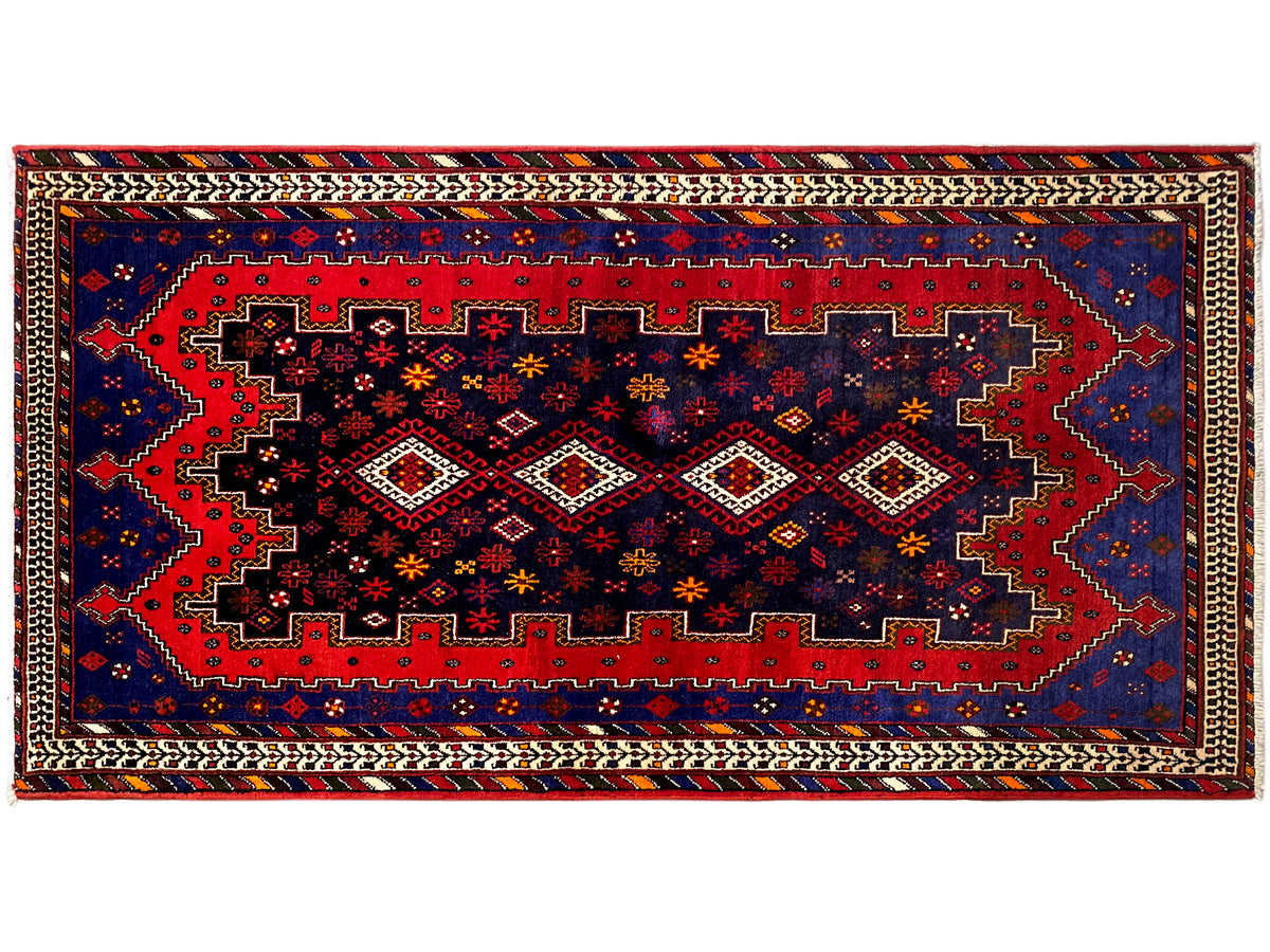 Teppichläufer mit breitem geometrischem Mittelband in Blau, Rot und beige Konturen