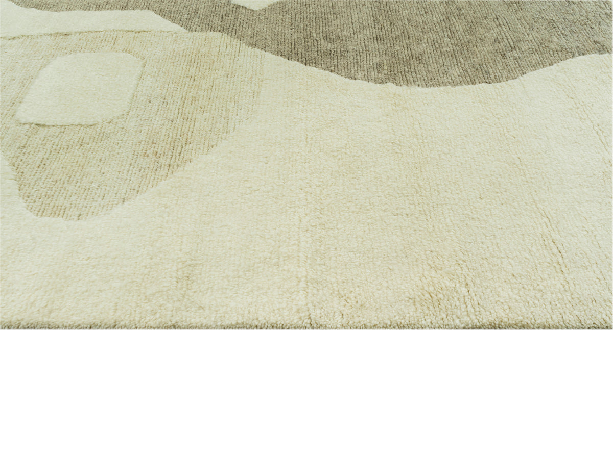 Teppich mit strukturierter Oberfläche in Creme und hellbraunem Muster