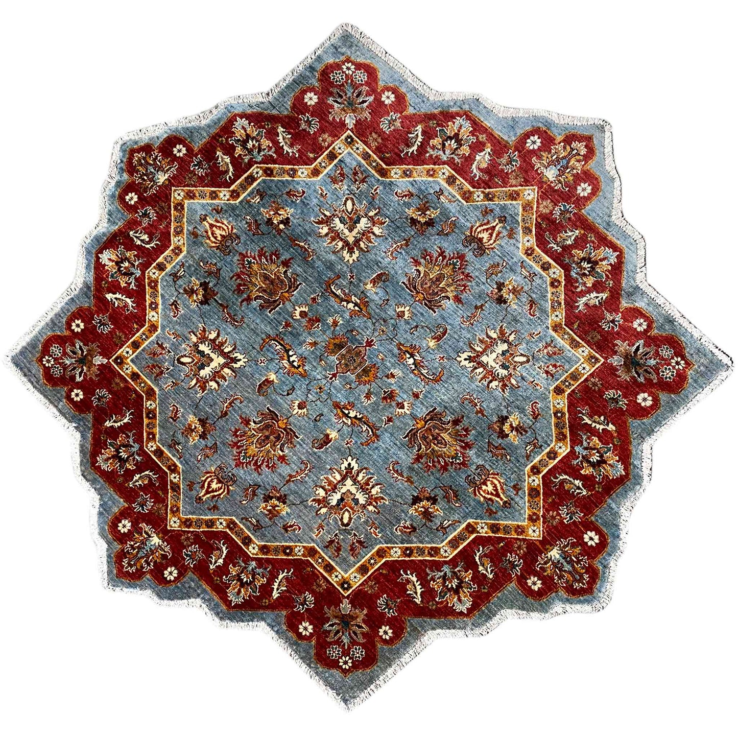 Sternförmiger handgeknüpfter Wollteppich mit blauem Fond und rotem Ornamentrand