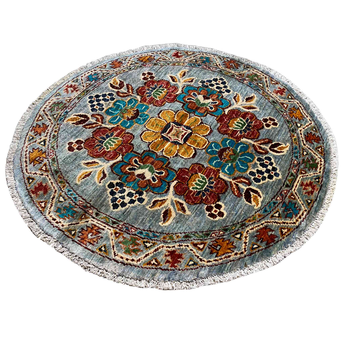 Runder Wollteppich mit blauem Blumenmuster und geometrischem Rand