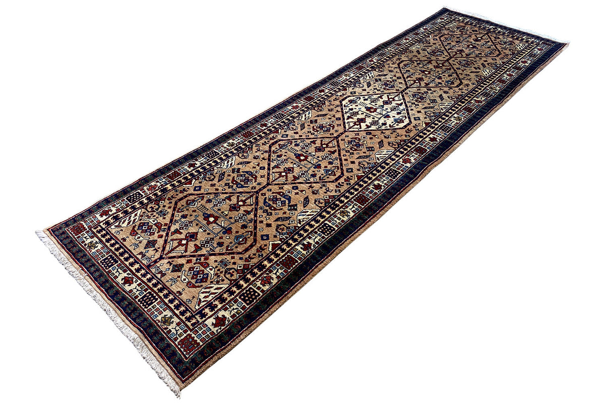 Teppich mit zentralem Medaillon und Bordüren, beige, dunkelblau, rote Akzente, Fransen