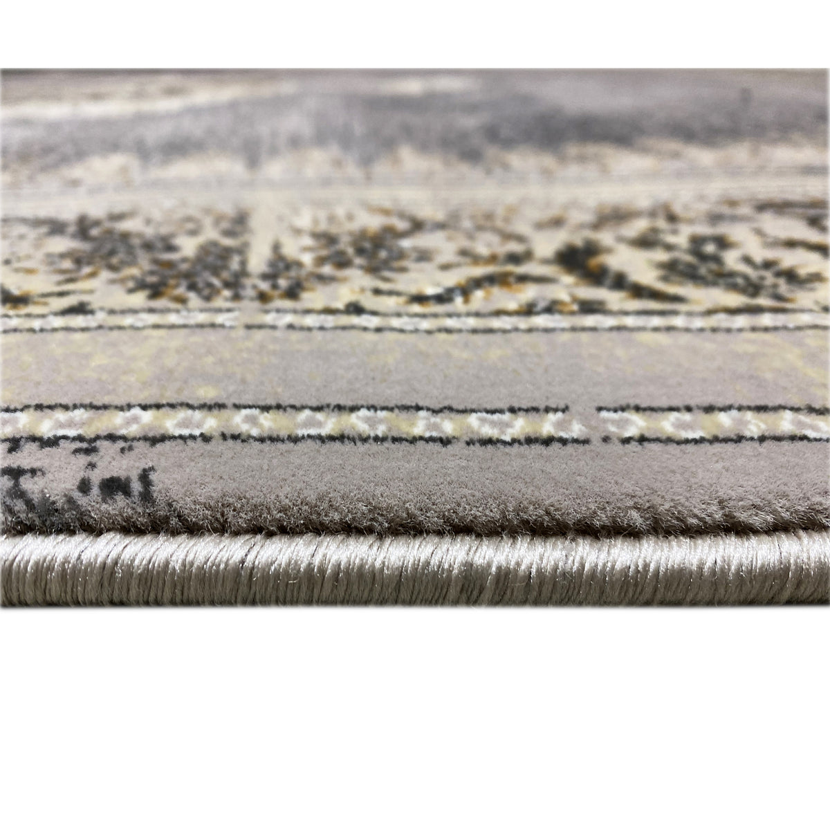Teppichkante mit Fransen und Musterstreifen, grau meliert, gold-beige Details