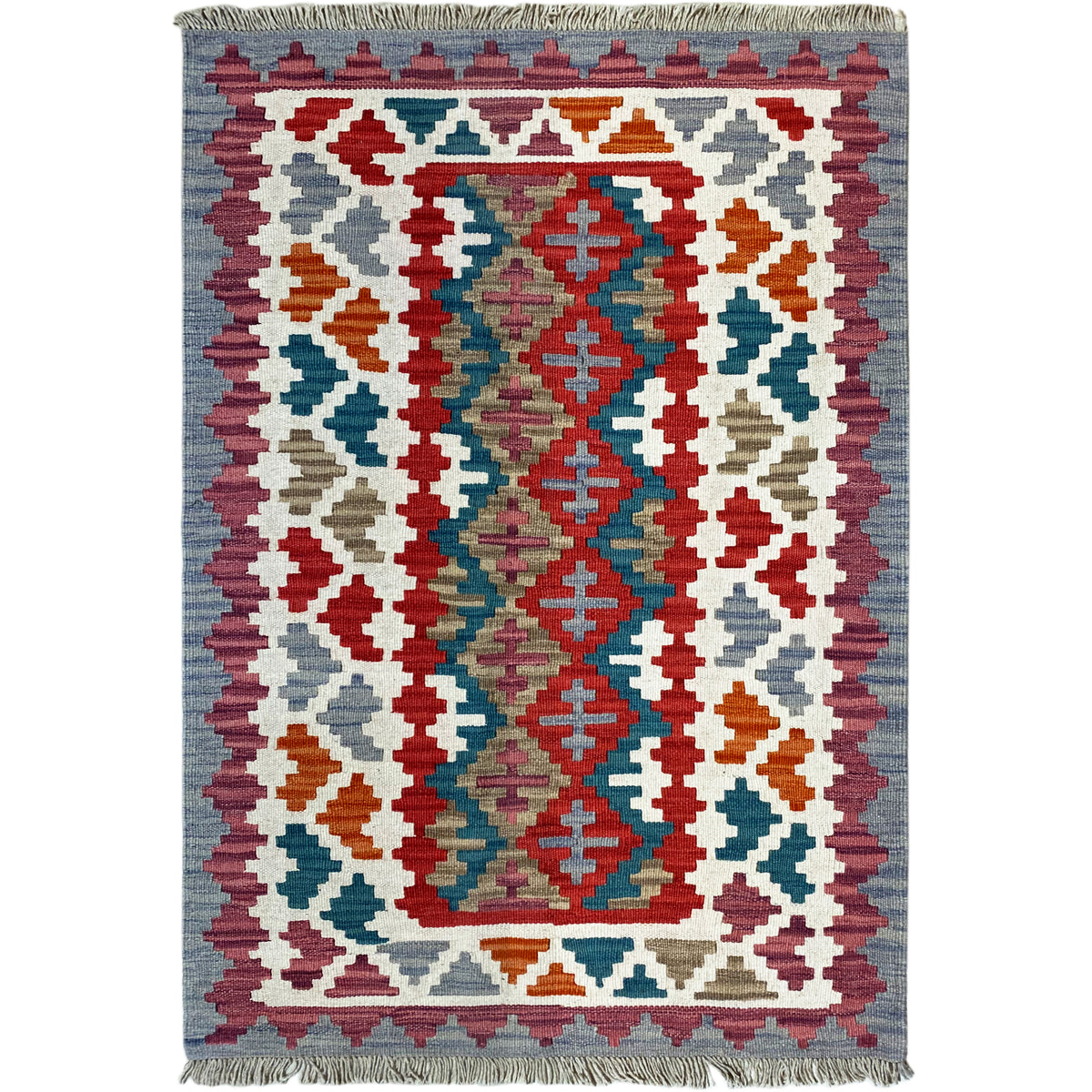 Blick auf Kelim Teppich mit mittigem Ornamente-Design und bunten Karo-Formen