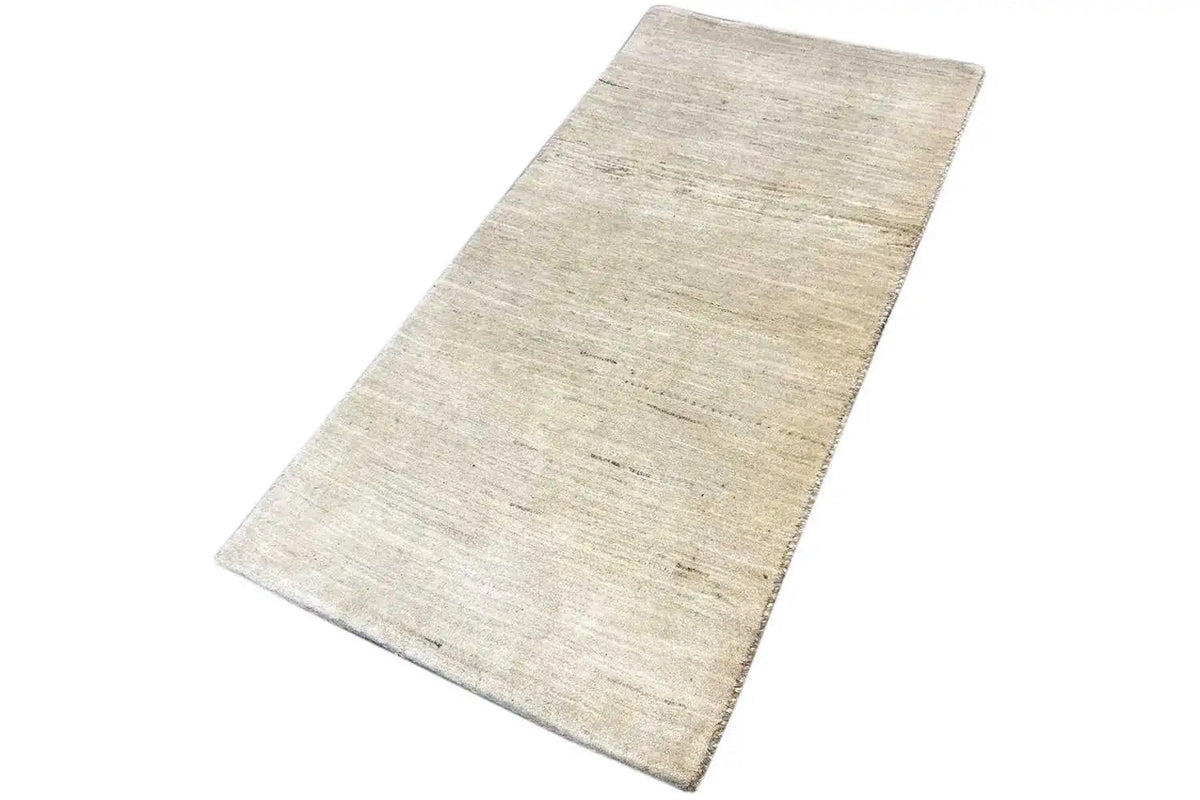 Gabbeh-Teppich in hellbeige, rechteckig, mit gleichmäßiger Strichstruktur und Textur