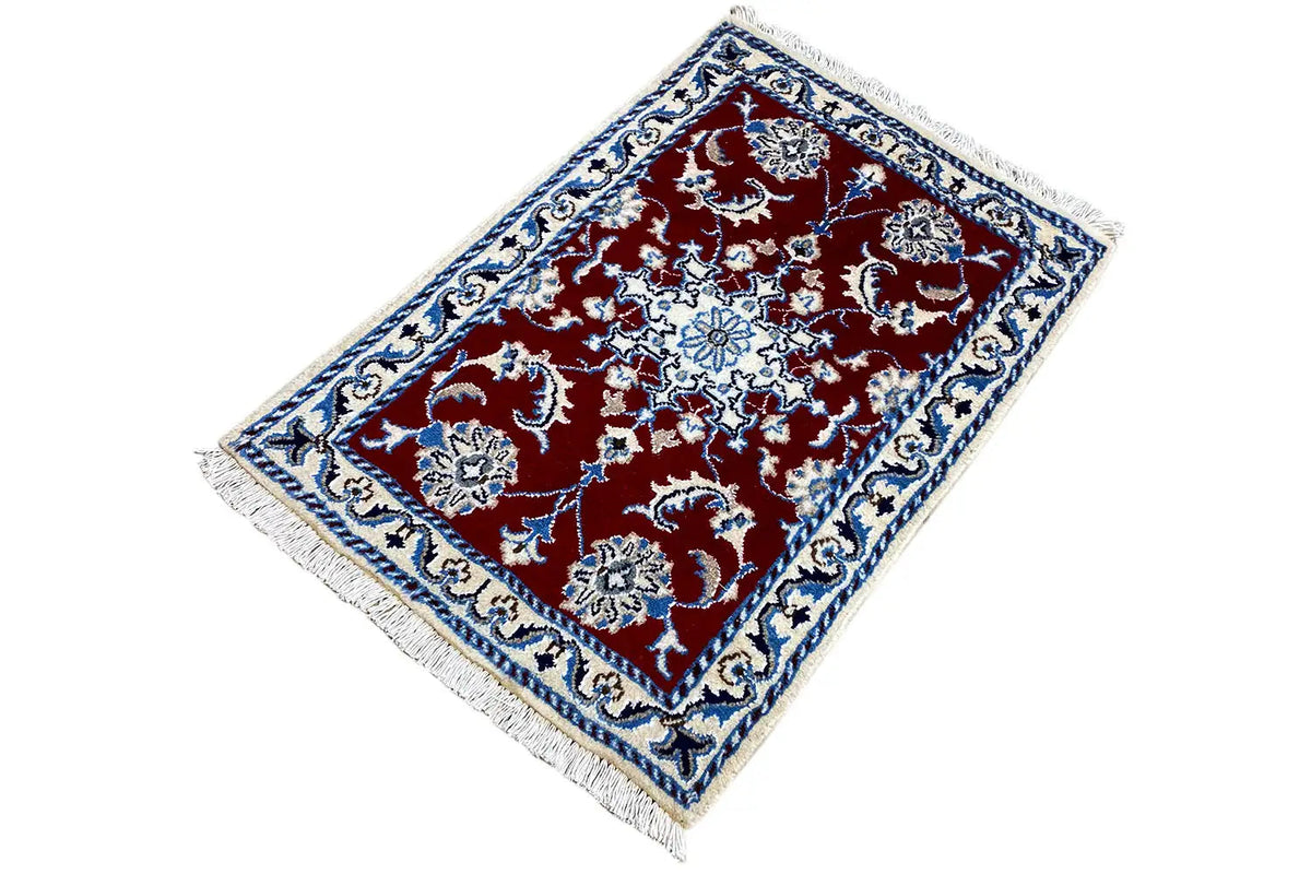 Nain-Teppich 87x59 cm schräg, rotes Feld mit blauer Rankenrahmung und Fransen