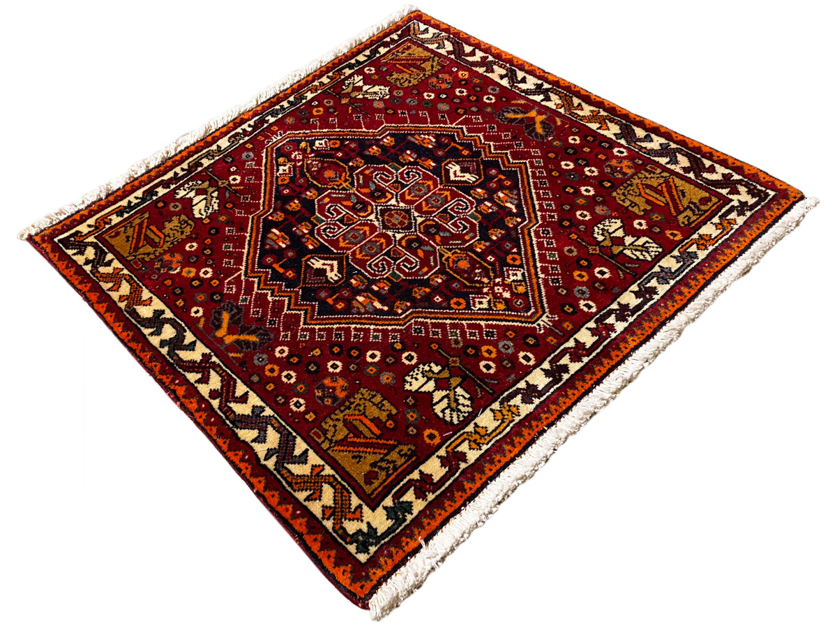 Poshti-Teppich 60x60 cm, rotes Bordürenmuster mit dunklem Mittelmedaillon und Fransen