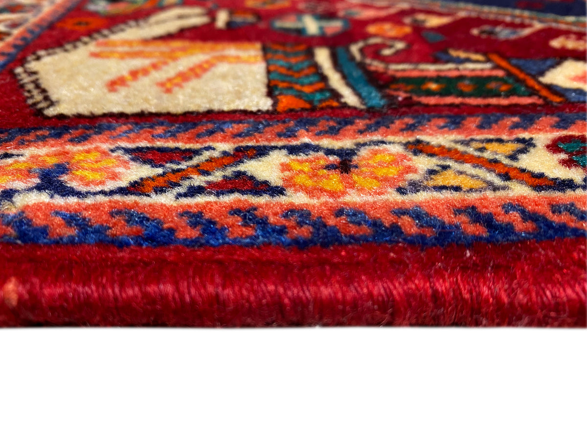 Poshti-Teppich 64x64 cm, Nahaufnahme Flor und Bordüre, rot-blau mit mehrfarbigen Akzenten