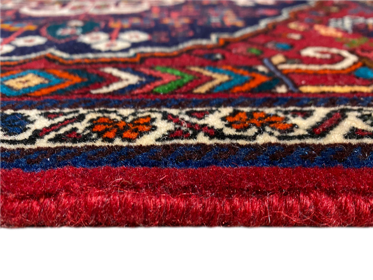 Teppichbordüre mit Zickzack- und Linienmustern, kurze Fransen, rot-blau