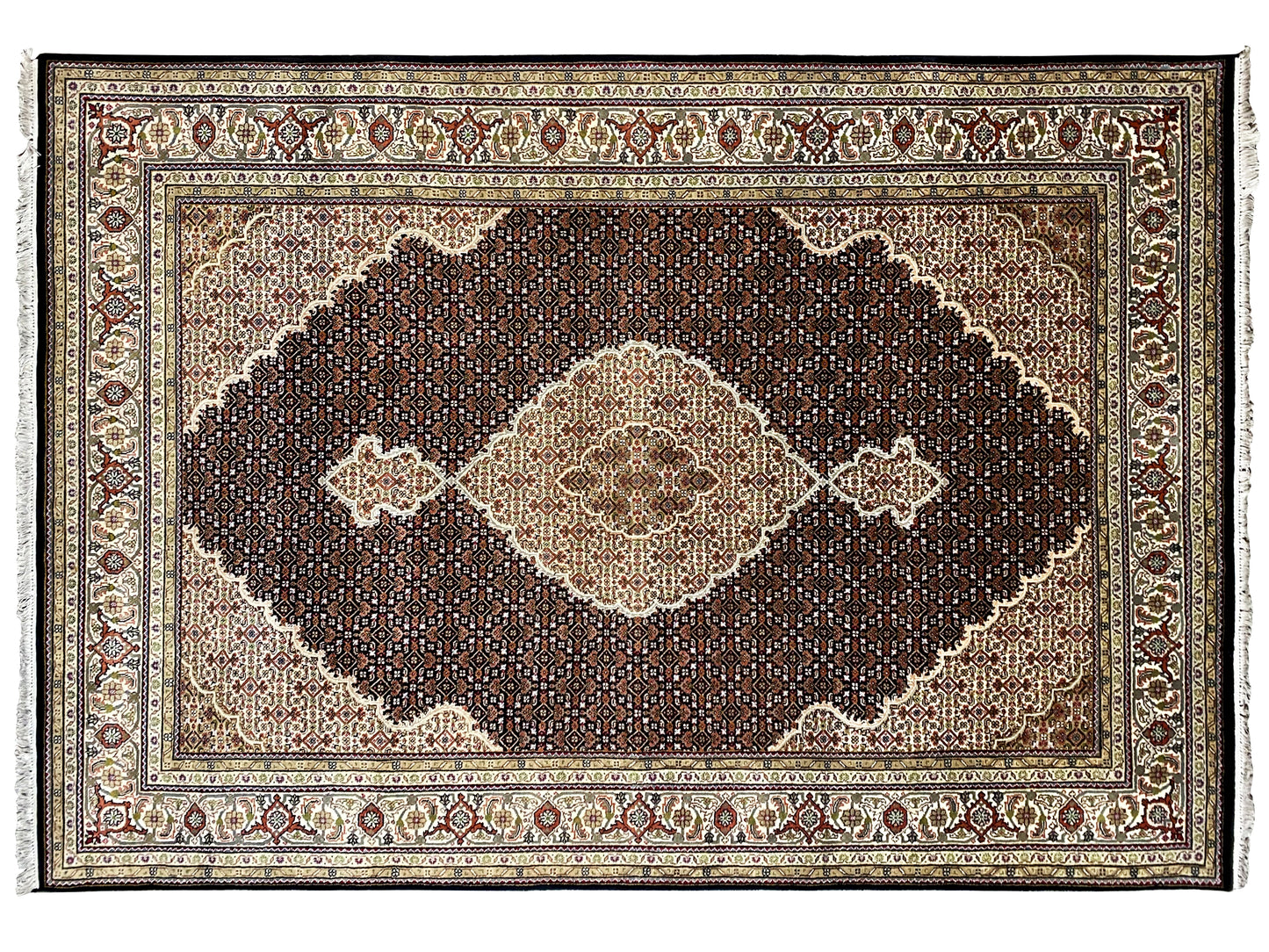 Handmade Indo Tabriz rug with central medallion design