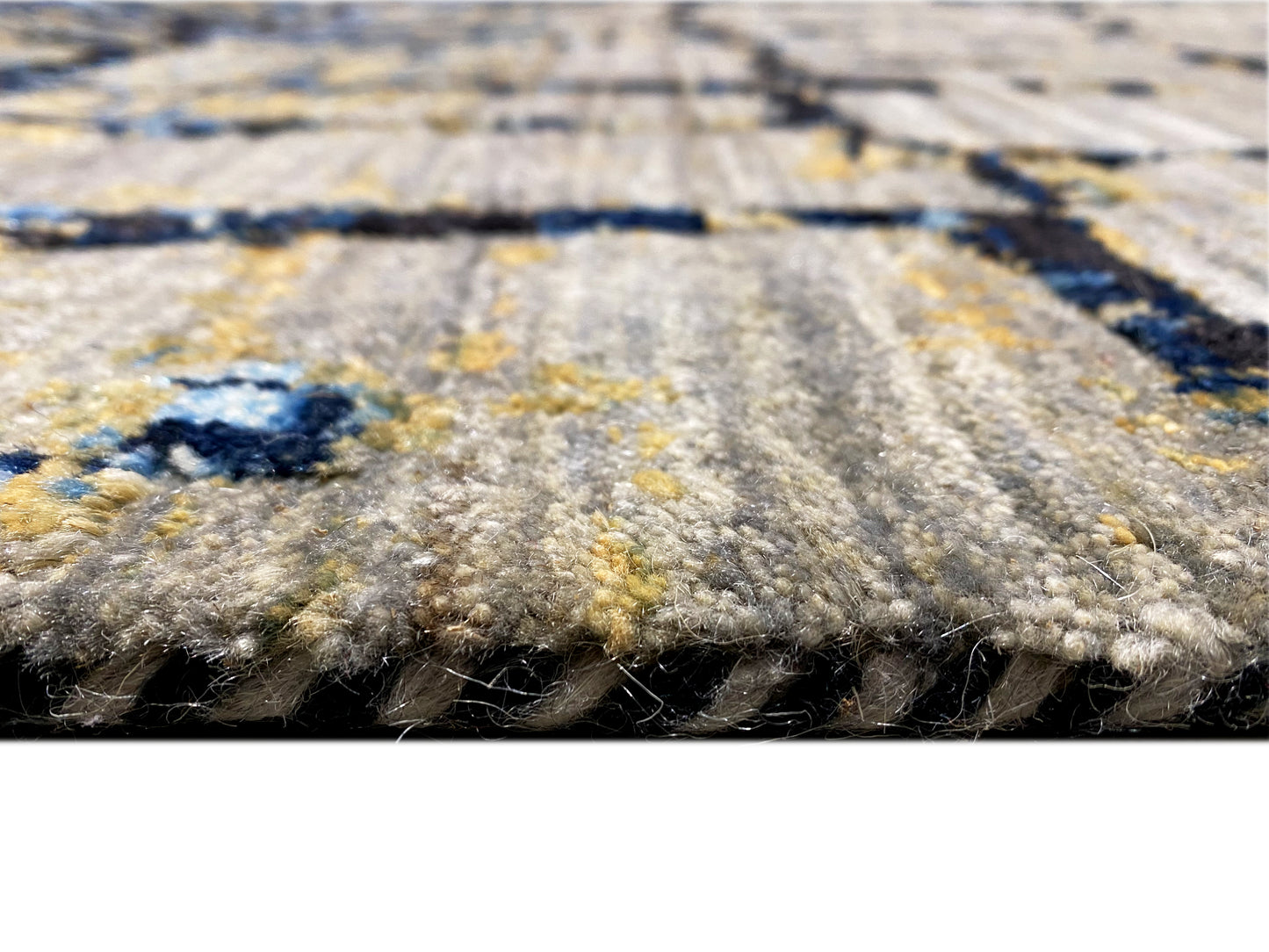 Designer Wollteppich für Wohnzimmer in kühlen Farbtönen